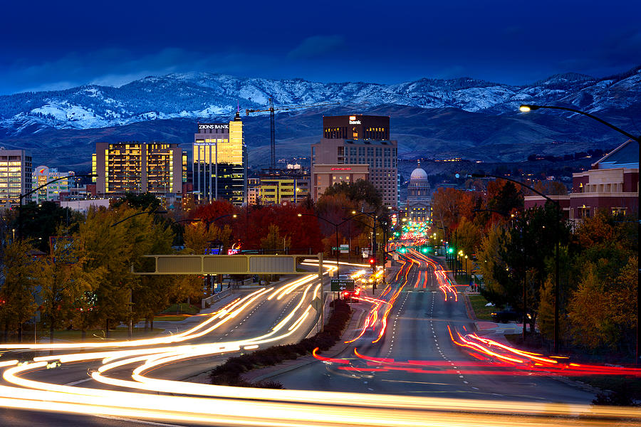 Boise Idaho downtown at dusk with fresh snow on hills and long exposure light trails Photograph by Anna Gorin
