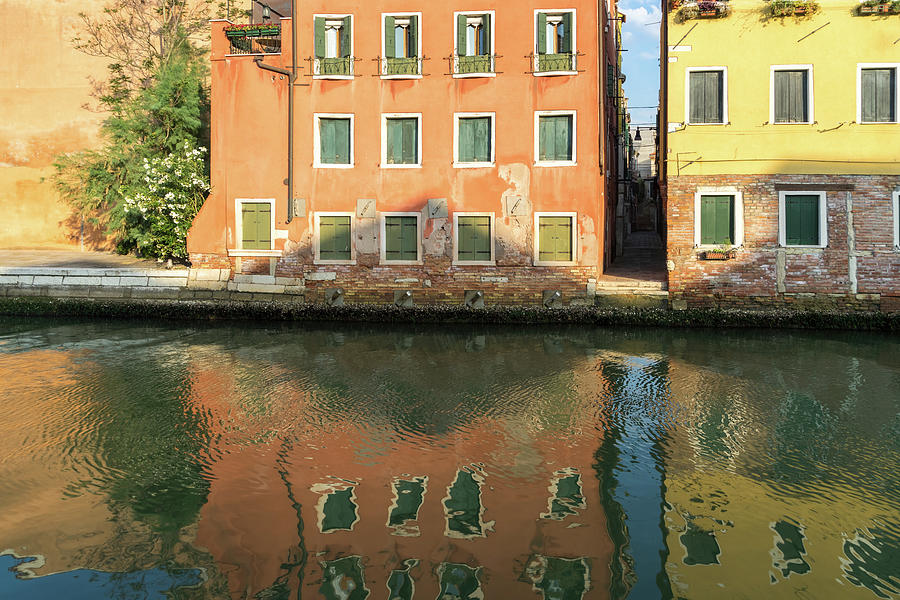 Bold and Vivid Venetian - Colorful Canalside Houses in Orange and Yellow Photograph by Georgia Mizuleva