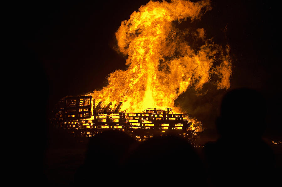 Bonfire and flames at Guy Fawkes Night firework display, night Photograph by Andrew Holt