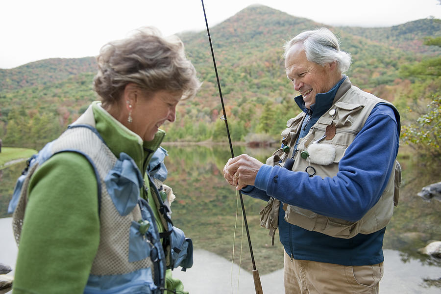 Boomer Couple Fly Fishing Photograph by Yellow Dog Productions