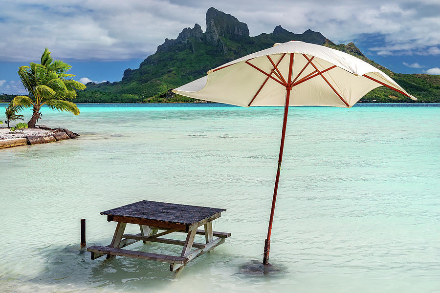 Bora Bora - picnic table in the lagoon Photograph by Olivier Parent