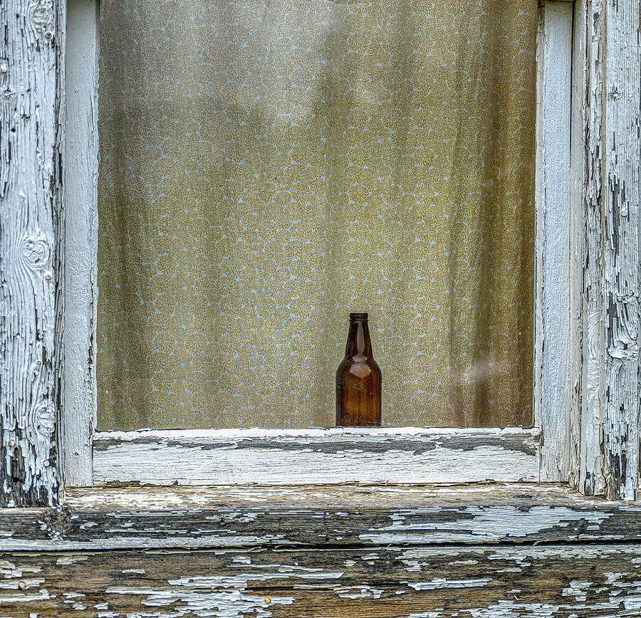 Bottle in a Window Photograph by Paul Freidlund