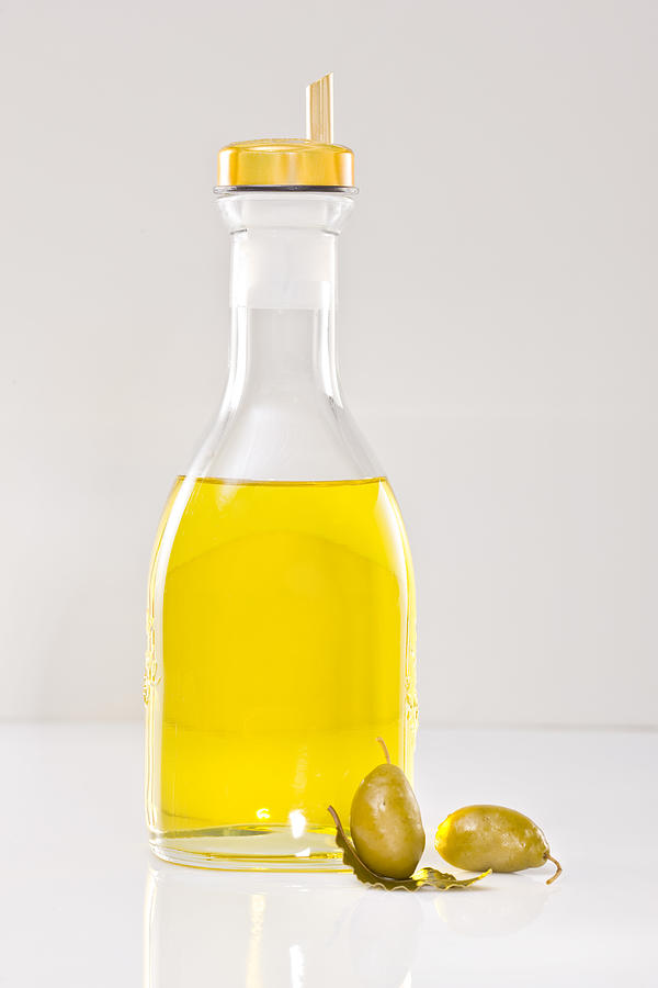 Bottle of olive oil with spout Photograph by Tooga