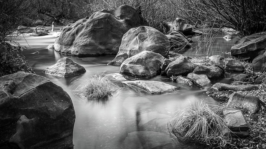 Boulders in Putah Creek Photograph by Mike Fusaro
