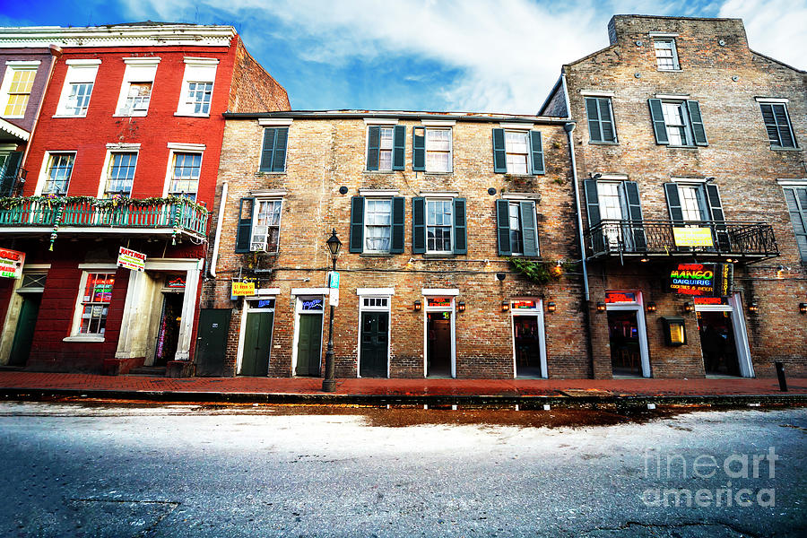 Bourbon Street Buildings in New Orleans Photograph by John Rizzuto