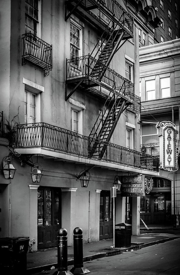 Bourbon Street Gateway In Black and White Photograph by Greg Mimbs