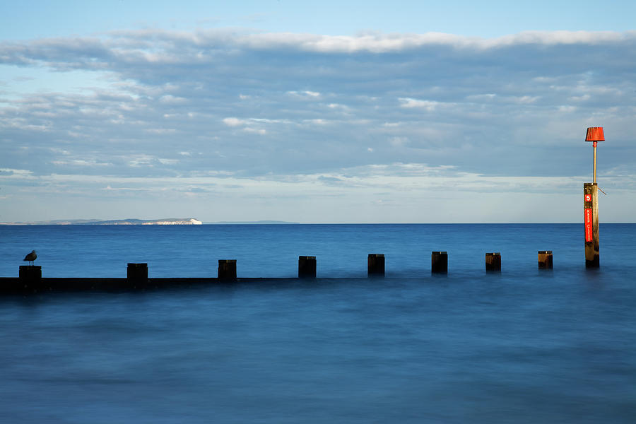 Bournemouth groyne at Sunset Photograph by Ian Middleton