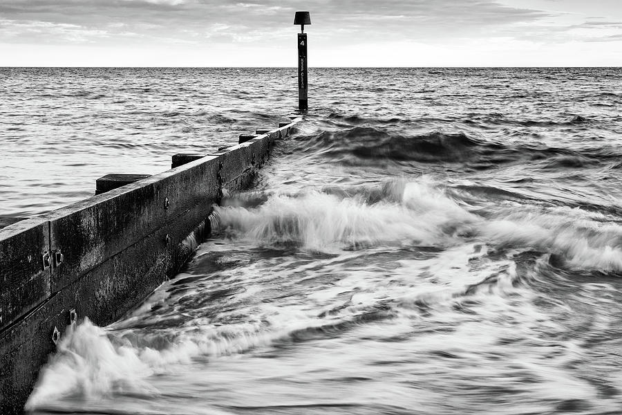 Bournemouth groyne in black and white Photograph by Ian Middleton