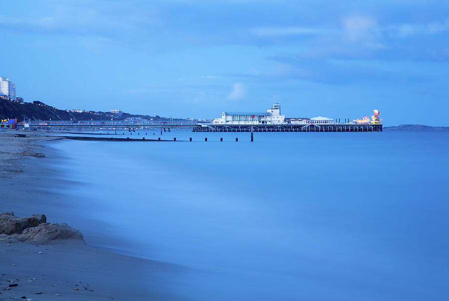 Bournemouth Pier at dusk Photograph by Ian Middleton