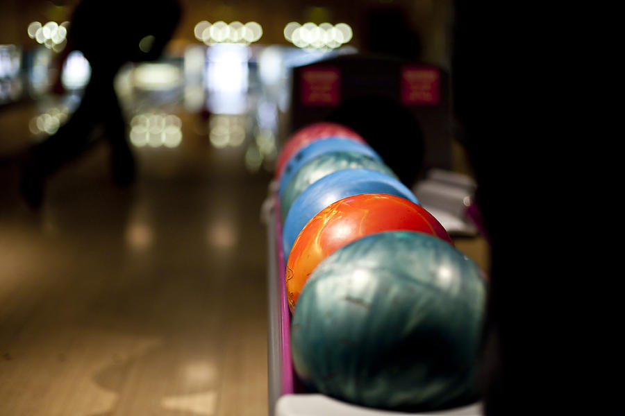 Bowling balls Photograph by Henry Donald