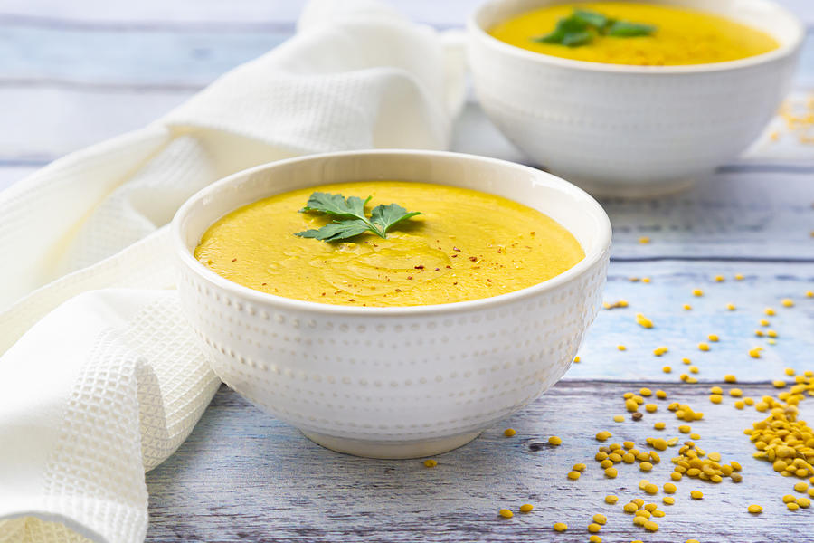 Bowls With Vegan Yellow Lentil Soup Photograph by Larissa Veronesi