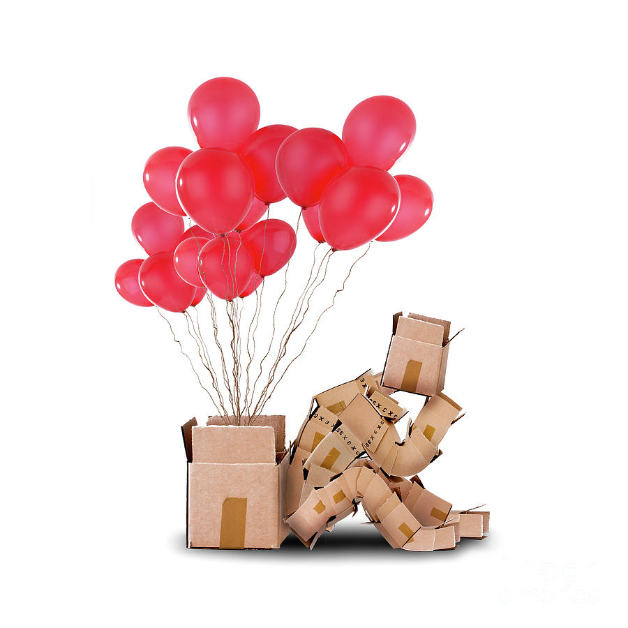Box character sat thinking with balloons gift Photograph by Simon Bratt