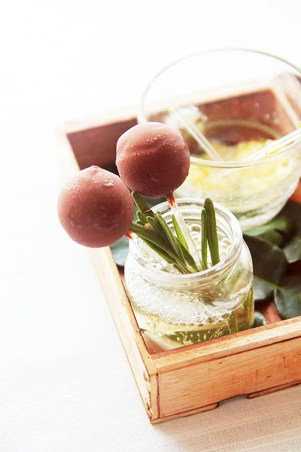Box With Glass And Lollipops On White Photograph by Cass Tang / EyeEm Box With Glass And Lollipops On White Photograph by Cass Tang / EyeEm