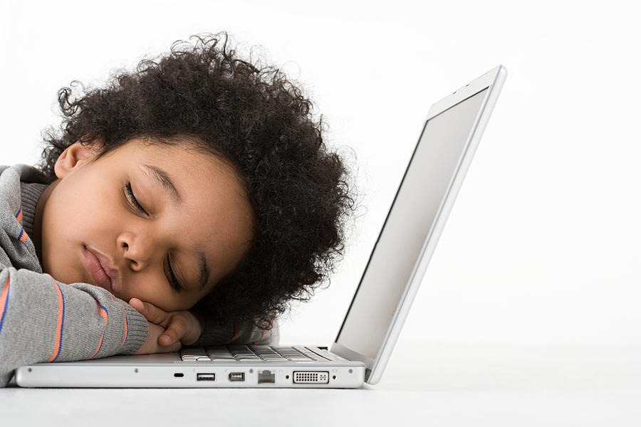 Boy asleep on laptop Photograph by Image_Source_