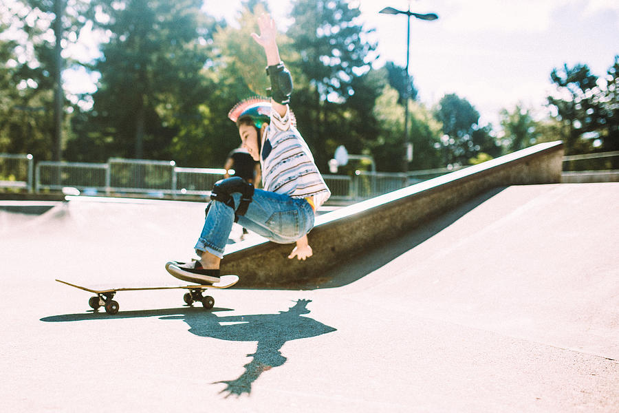 Boy Falling off Skateboard at Skate Park Photograph by RyanJLane