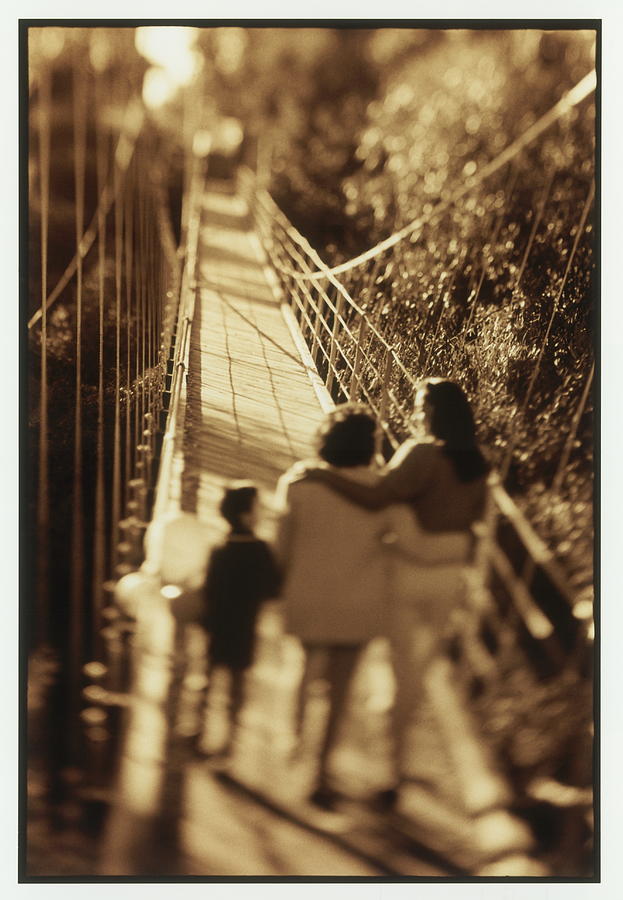 Boy, Grandmother And Mother On Suspension Bridge Photograph by Stephen Simpson