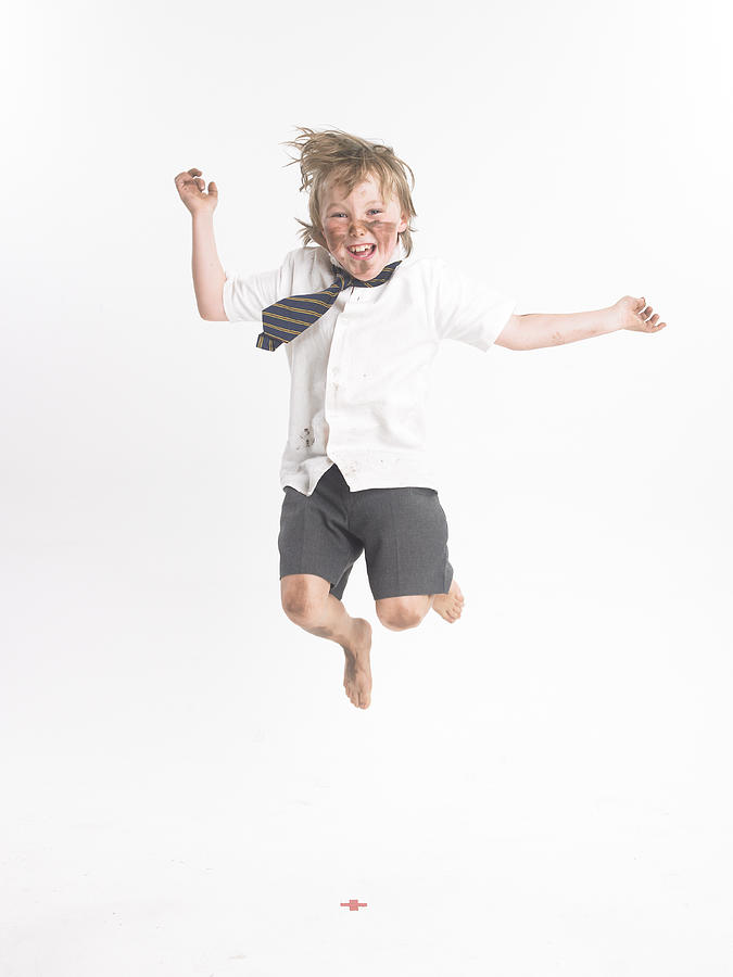 Boy jumping Photograph by Devon Strong