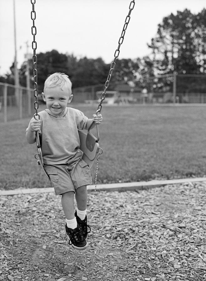 Boy on swing Photograph by Shane ODonnell