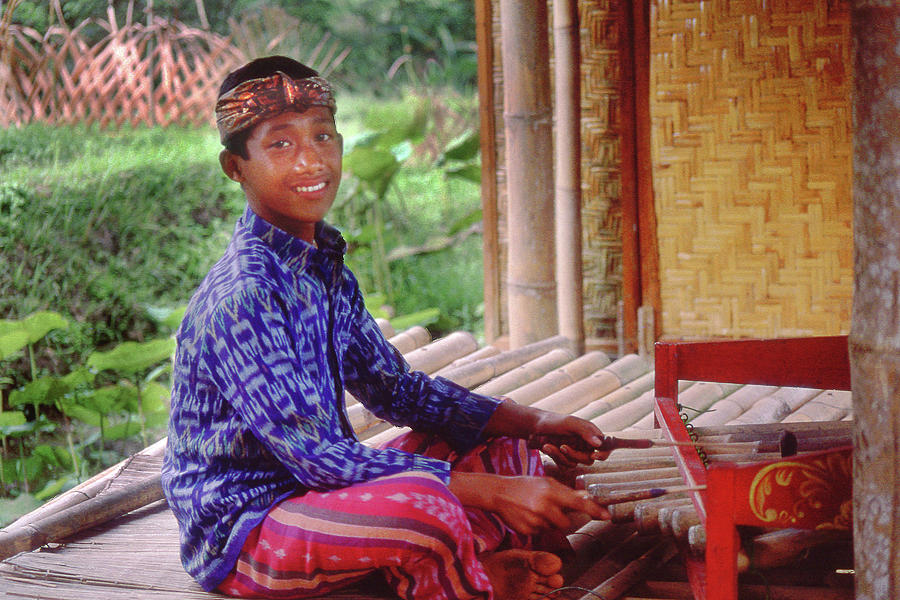 Boy Playing Gamelan Music Photograph by Jerry Griffin