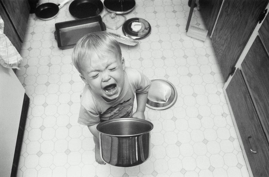 Boy Playing With Pots And Pans, Screaming Photograph by Sean Justice