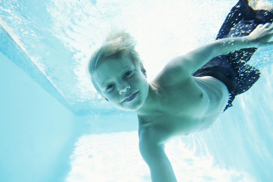 Boy Swimming Underwater Photograph by B2M Productions