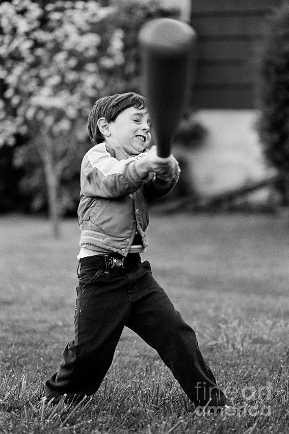 Boy Swinging Baseball Bat  Photograph by Jim Corwin