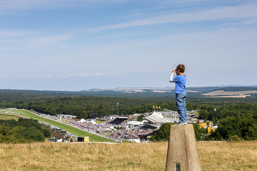 Boy viewing Goodwood racecourse Photograph by Paul Mansfield Photography