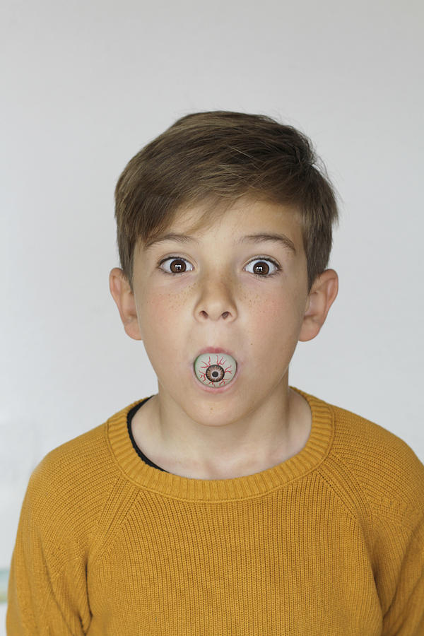 Boy with crazy eyes Photograph by Isabel Pavia