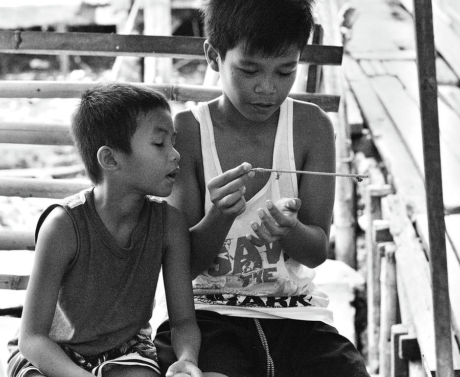 Boys and Spiders, Sasa Port, Davao Photograph by John Florey - Fine Art ...