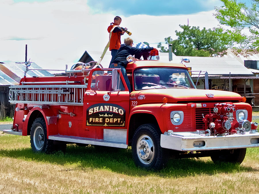 Boys on Fire Truck in Shaniko, Oregon. Photograph by Ruth Hager