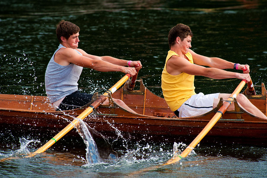 Boys rowing in a regatta Photograph by Michael Roberts