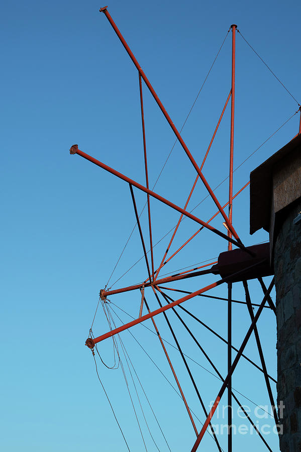 Bozcaada Windmill Arms Photograph by Bob Phillips