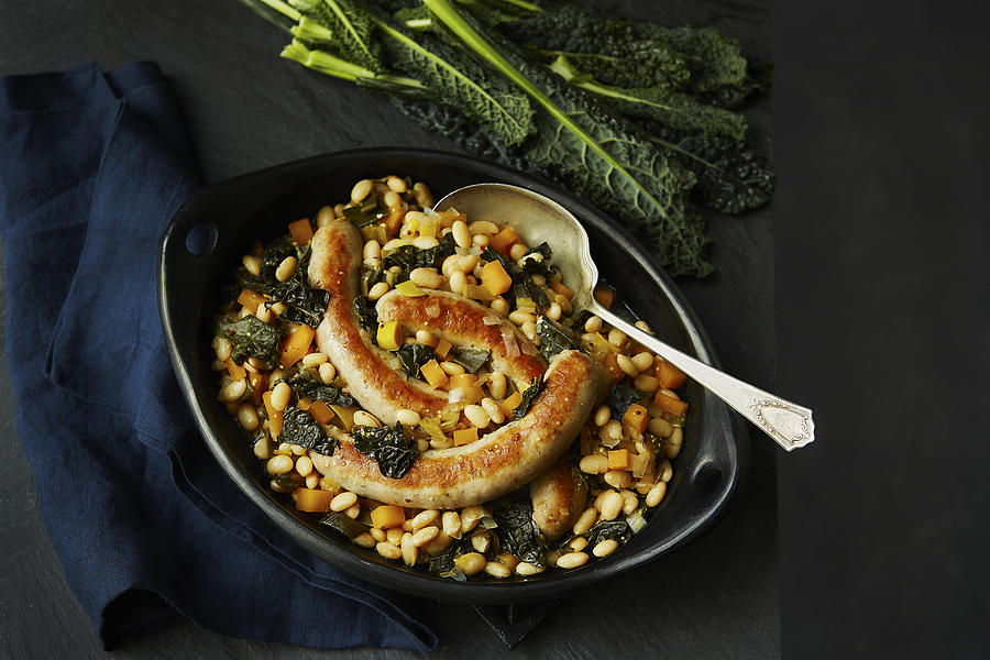 Braised White Bean, Yam, Kale And Bratwurst Sausage Stew Photograph by Tracey Kusiewicz/Foodie Photography