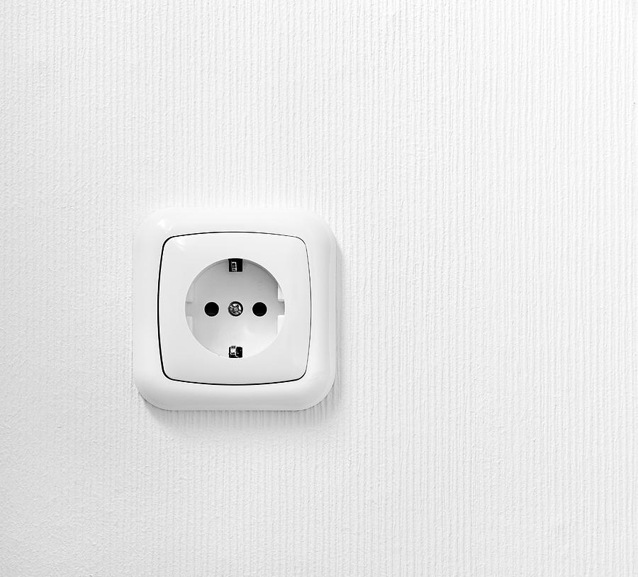 Brand New Outlet On A White Wall Photograph by Deepblue4you