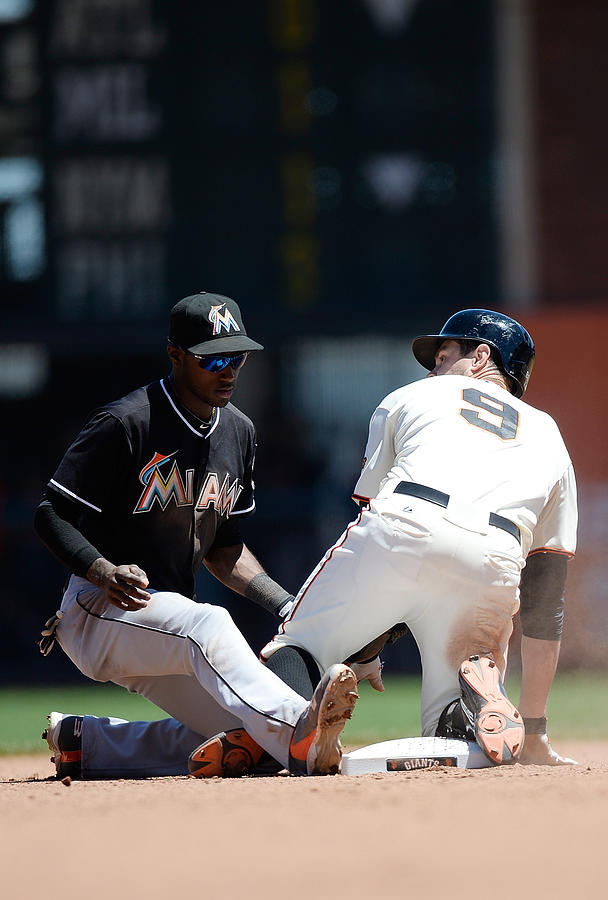 Brandon Belt and Adeiny Hechavarria Photograph by Thearon W. Henderson