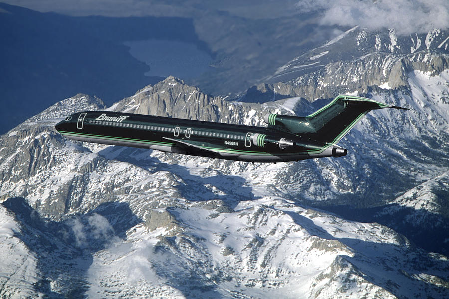 Braniff Boeing 727 over Snowcapped Mountains Mixed Media by Erik Simonsen