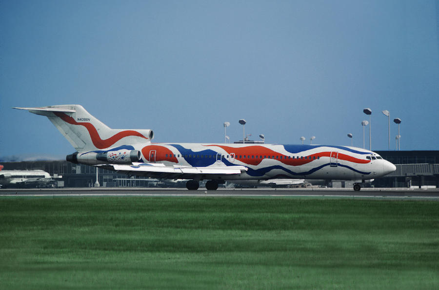 Braniff Calder Design Boeing 727 at Minneapolis Photograph by Erik Simonsen