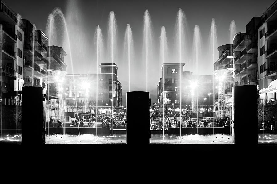 Branson Landing Town Square Shooting Fountains In Black and White Photograph by Gregory Ballos