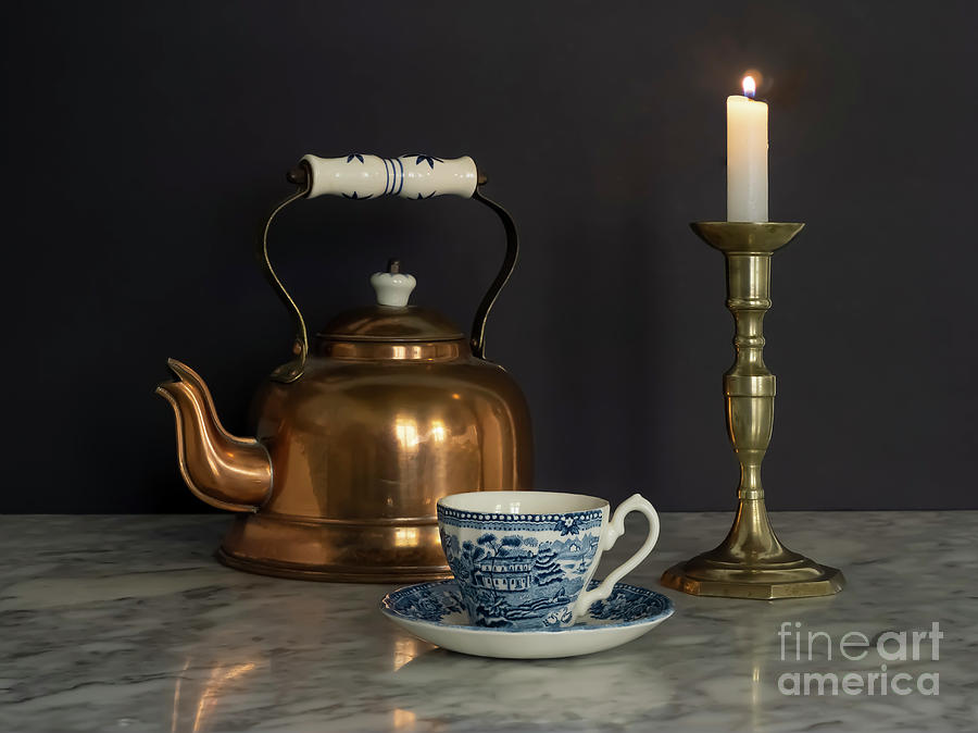 Brass Kettle and Candlelight and China Cup on Marble table Black Background Photograph by Pablo Avanzini