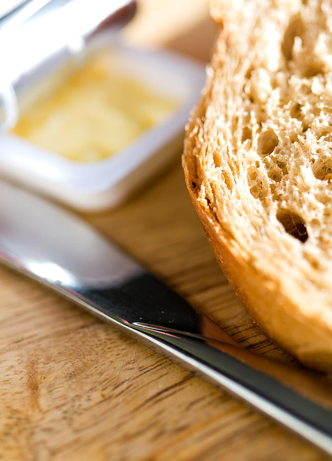 Bread and butter, closeup Photograph by Stockyimages