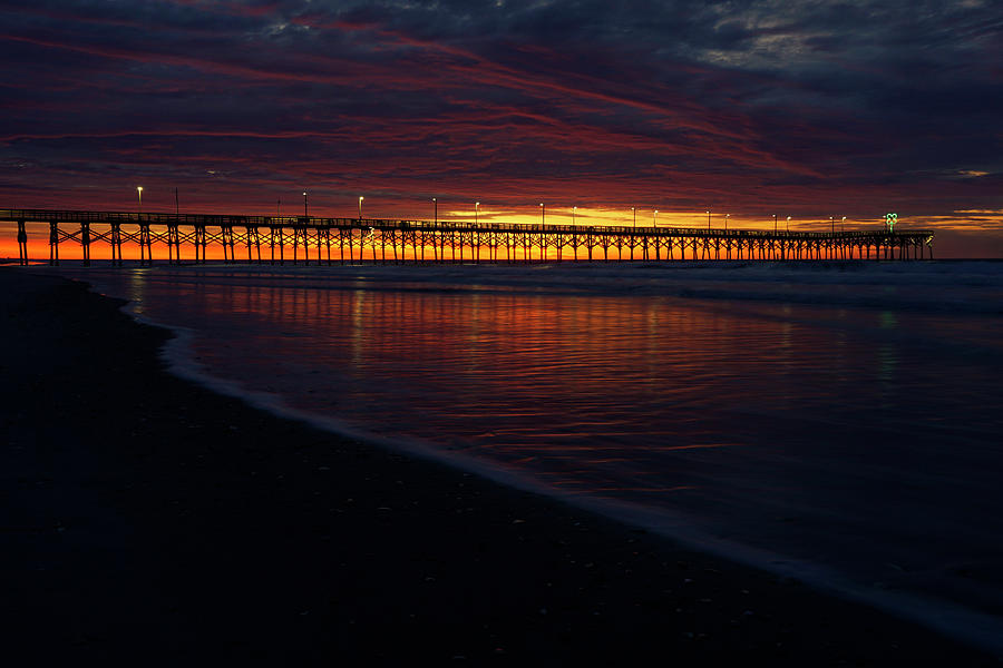 Nature Photograph - Break of dawn at Surf City Pier in North Carolina by Paul Hamilton