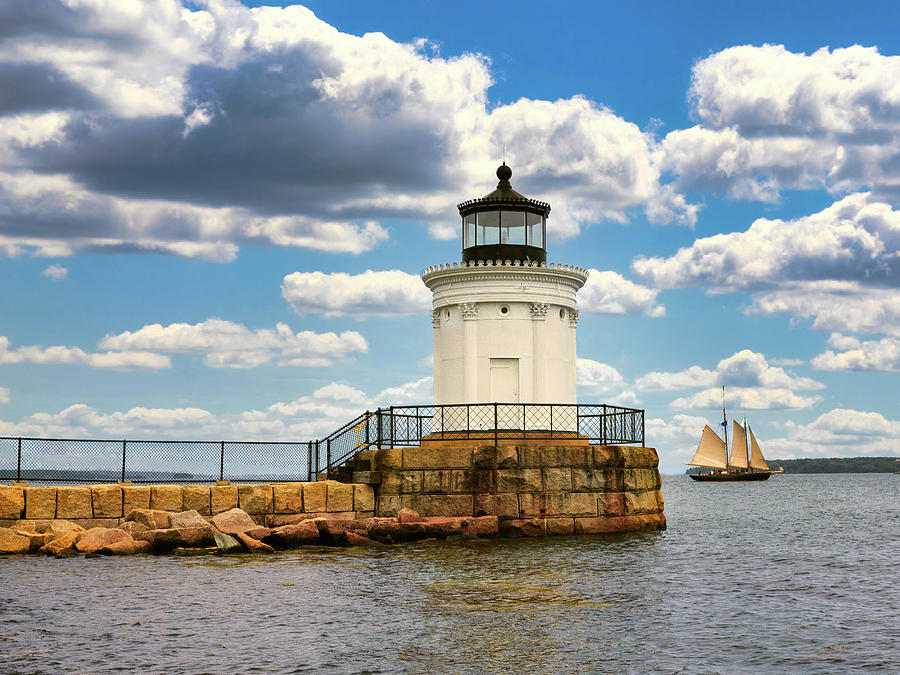 Breakwater Lighhouse And Sailboat Photograph