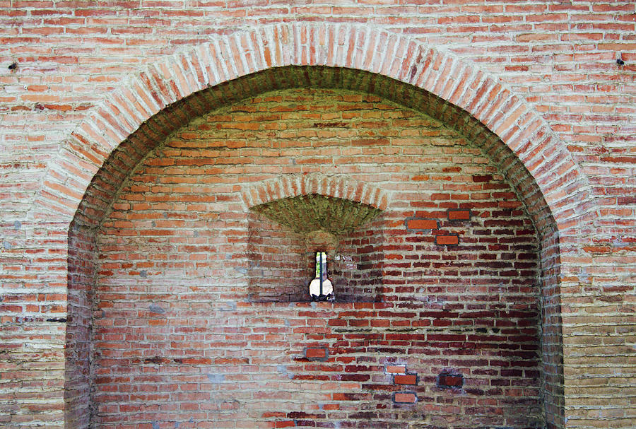 Brick Photograph - Brick arch on old citadel wall with a keyhole like shape window by Cosmin Albu Brick Photograph - Brick arch on old citadel wall with a keyhole like shape window by Cosmin Albu
