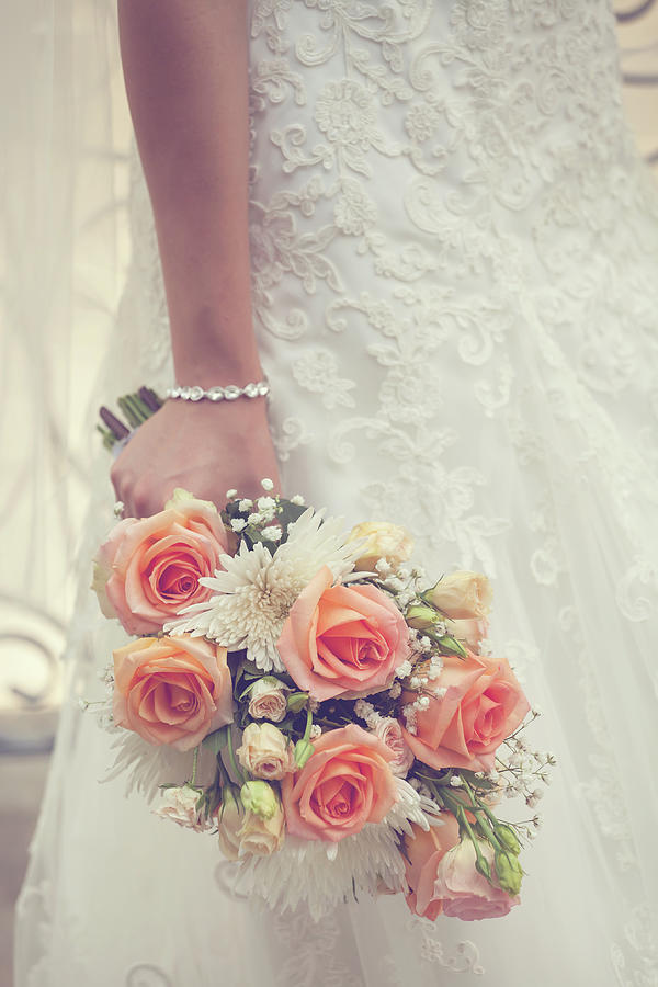 Bride Holding A Wedding Bouquet Photograph