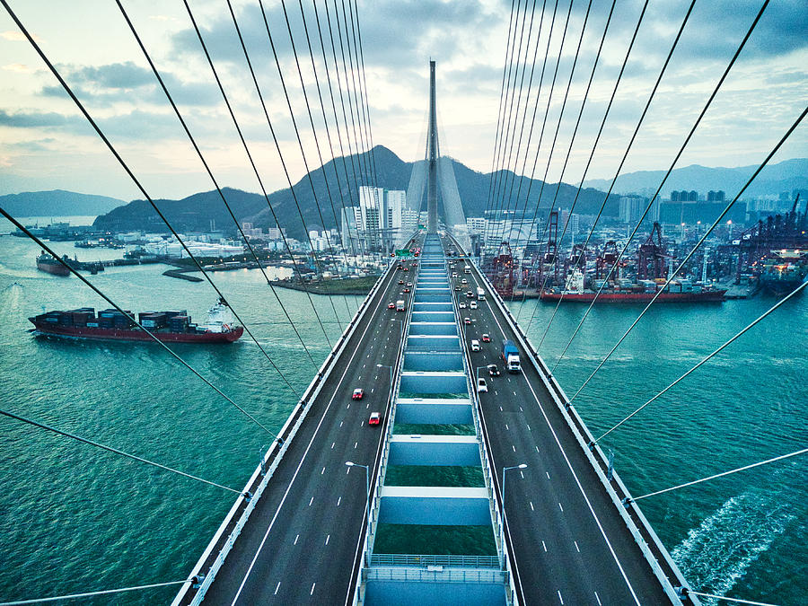 Bridge in Hong Kong and Container Cargo freight ship Photograph by Nikada