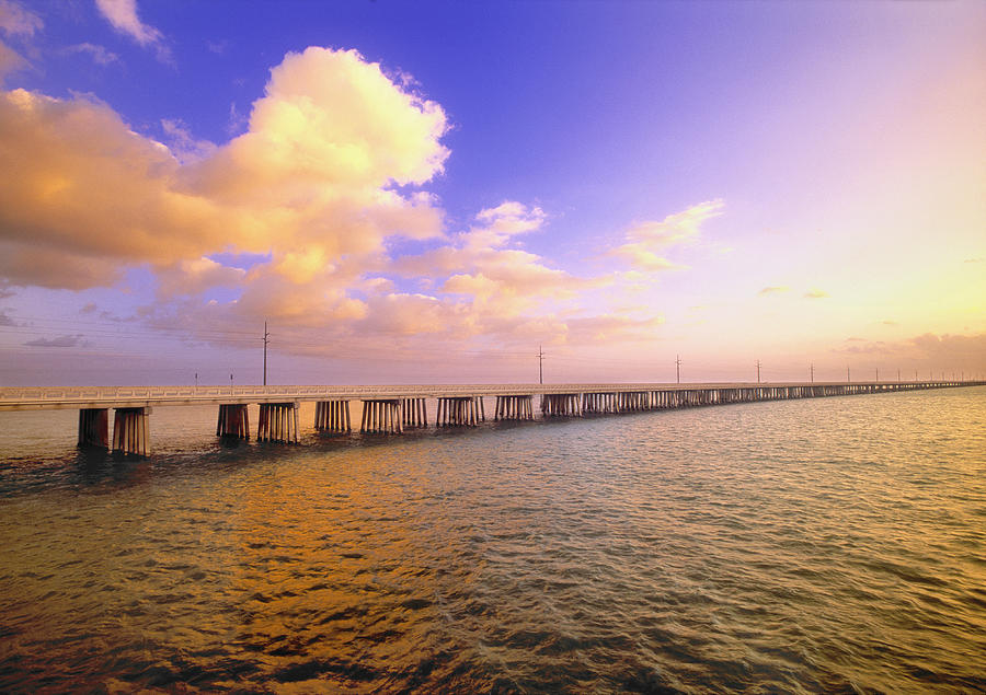 Bridge over water at Photograph by John Coletti