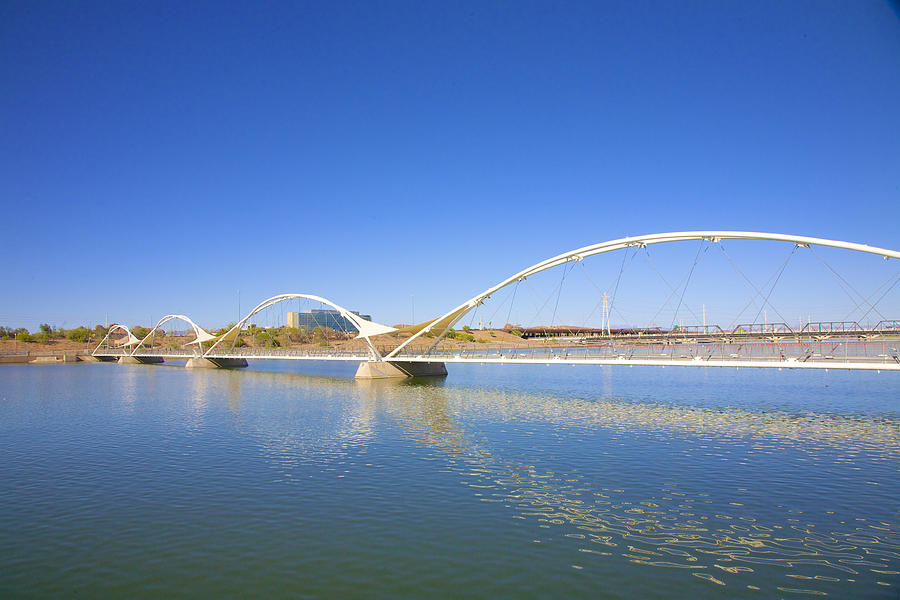 bridge with arches over water in Tempe, AZ Photograph by Barry Winiker