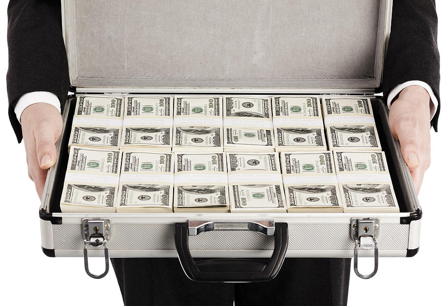 Briefcase full of money Photograph by Aluxum