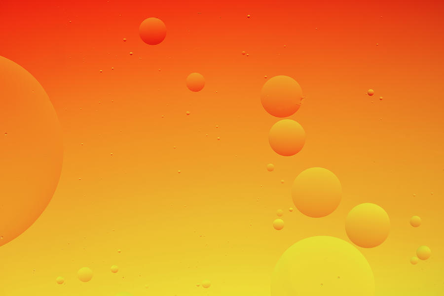 Bright abstract, yellow and orange background with flying bubbles Photograph by Michalakis Ppalis