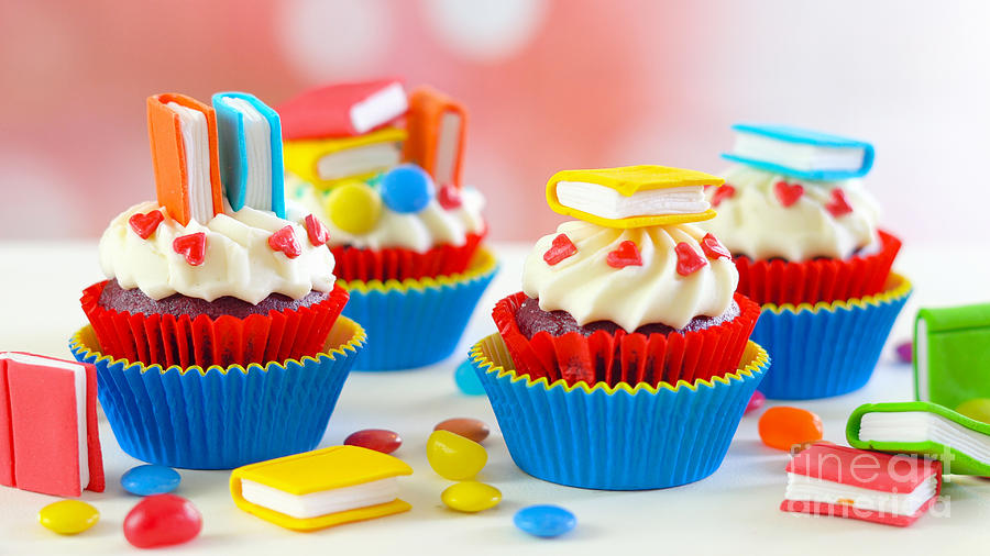 Bright colorful Back to School theme cupcakes. Photograph by Milleflore Images